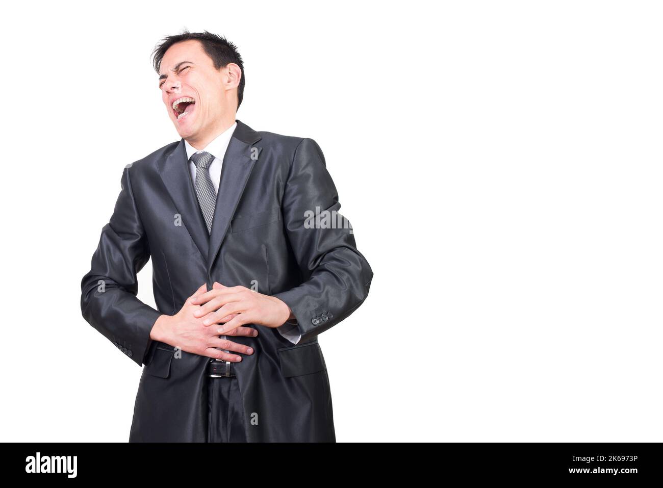 laughing-man-in-black-suit-against-white-background-2K6973P.jpg