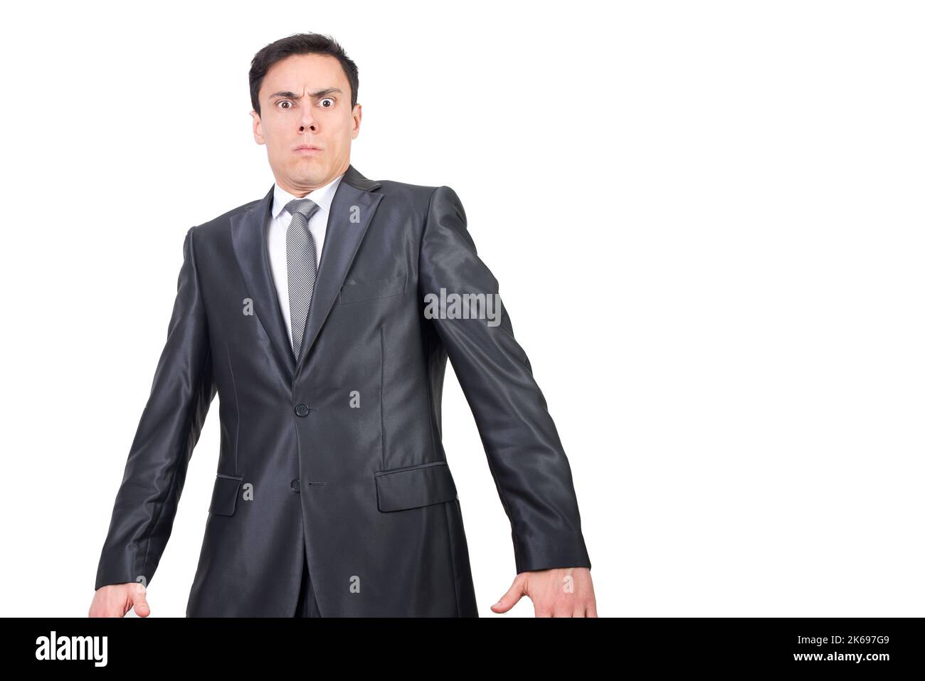 Surprised man in suit looking at camera Stock Photo