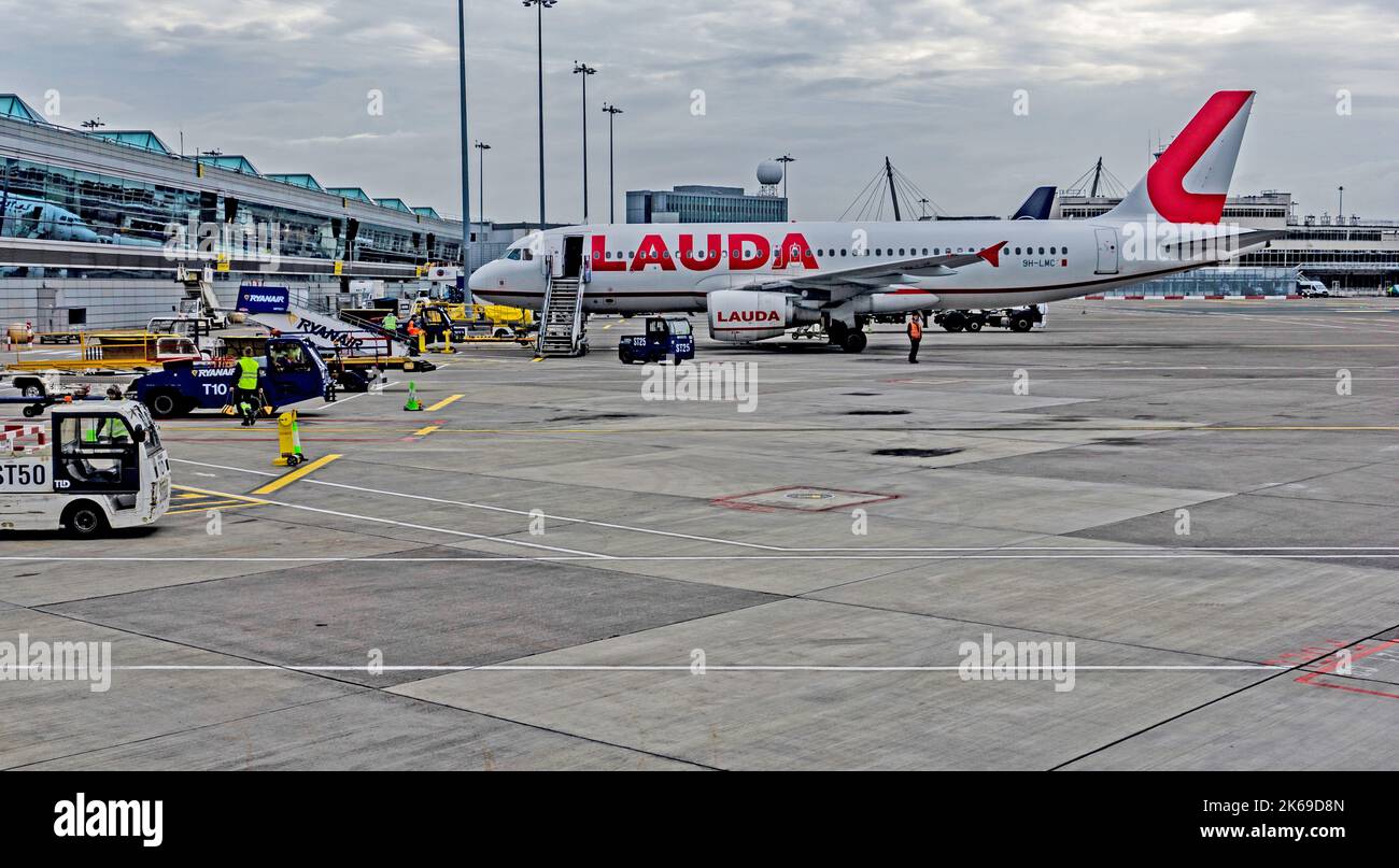 A Lauda Airlines jet on the tarmac at Dublin Airport, Ireland. Laura is a subsidiary company of Ryanair. Stock Photo