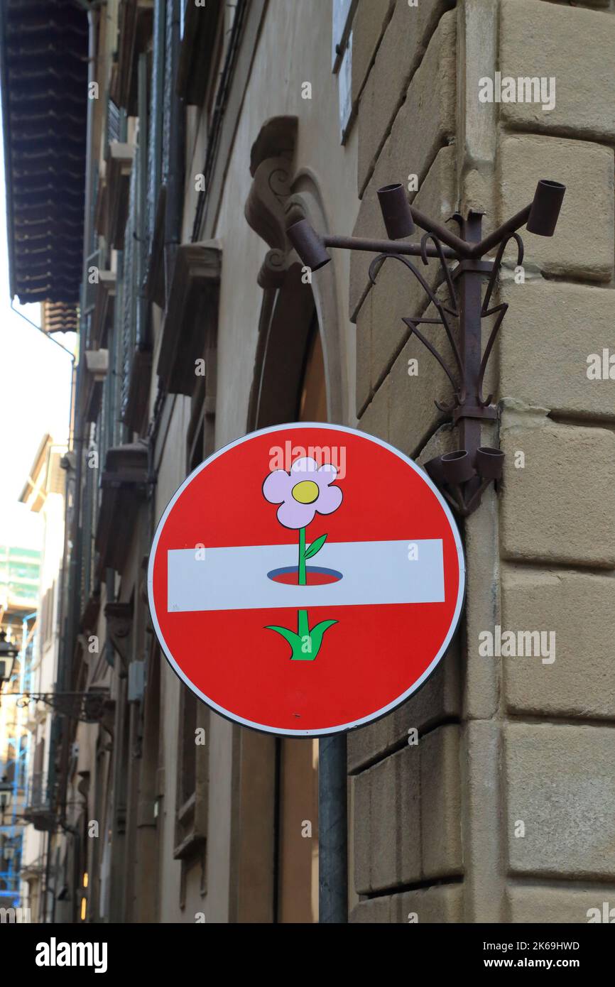 Strange funny street signs in Florence by the artist Clet Abraham Stock Photo
