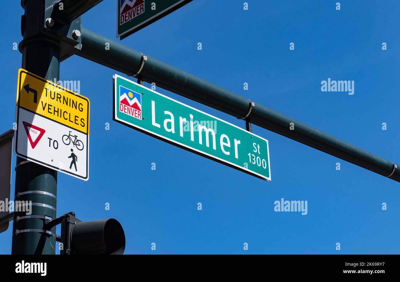 Denver, Colorado - August 12, 2022: Street sign at the corner of Larimer and 15th street at Larimer Square in Denver, Colorado Stock Photo