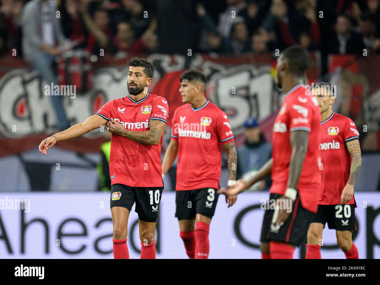 left to right Kerem DEMIRBAY (LEV), Piero HINCAPIE (LEV), Charles ARANGUIZ (LEV) disappointed. Soccer Champions League, preliminary round 4th matchday, Bayer 04 Leverkusen (LEV) - FC Porto, on October 12th, 2022 in Leverkusen/ Germany. © Stock Photo