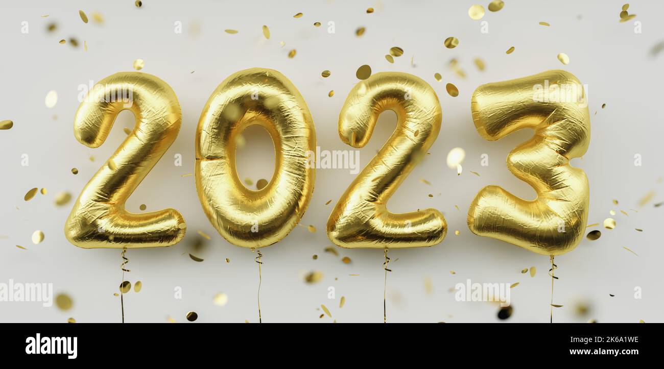 Happy New 2023 Year. 2023 golden foil balloons and falling confetti on white background. Gold helium balloon numbers. Festive poster or banner concept Stock Photo