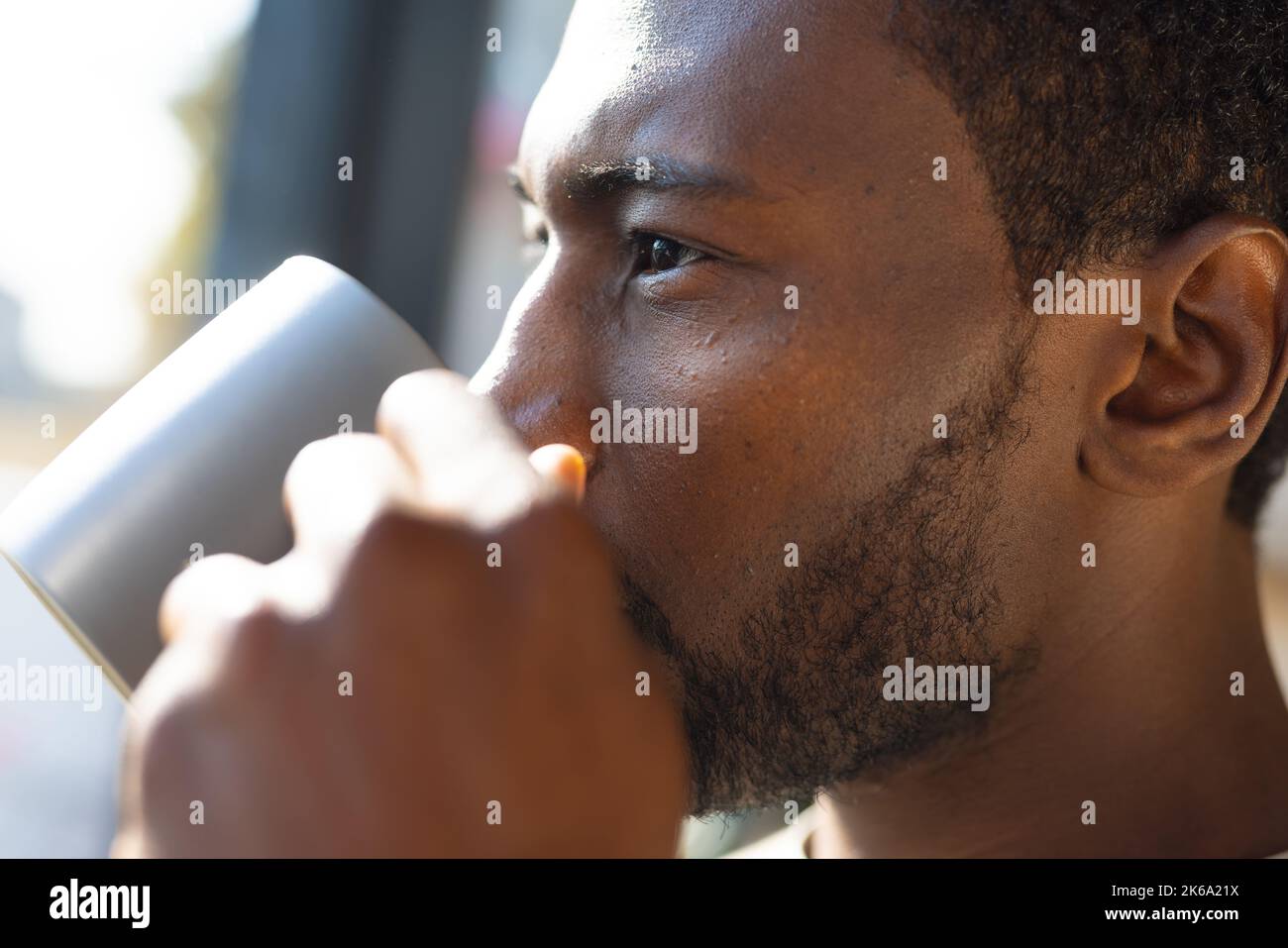 Happy african american man drinking hi-res stock photography and images ...