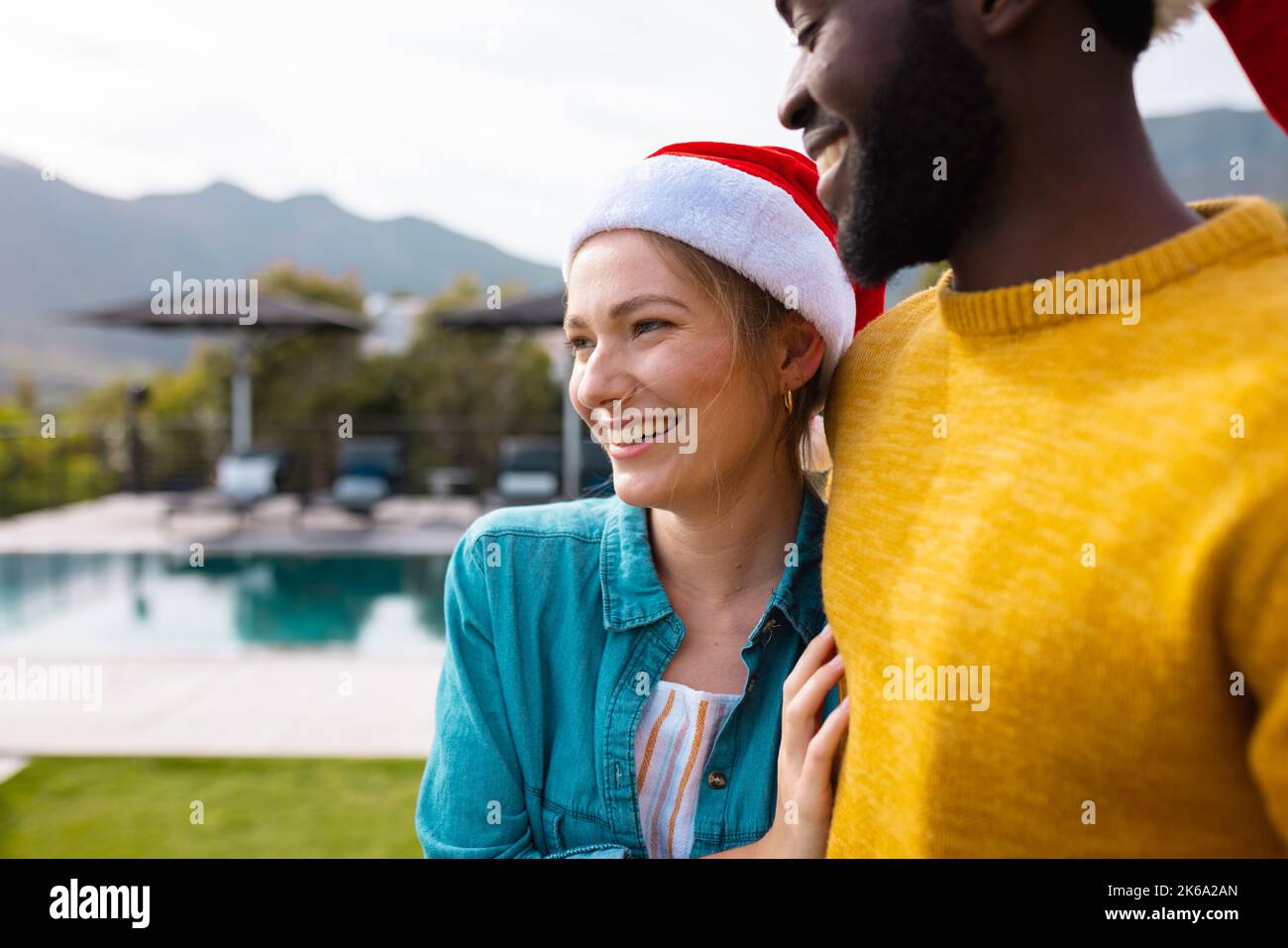 Diverse friends in santa hats hi-res stock photography and images - Alamy