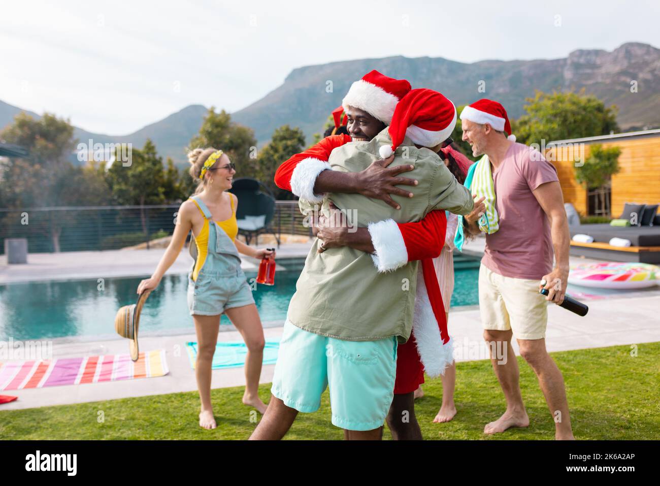 Diverse friends in santa hats hi-res stock photography and images - Alamy