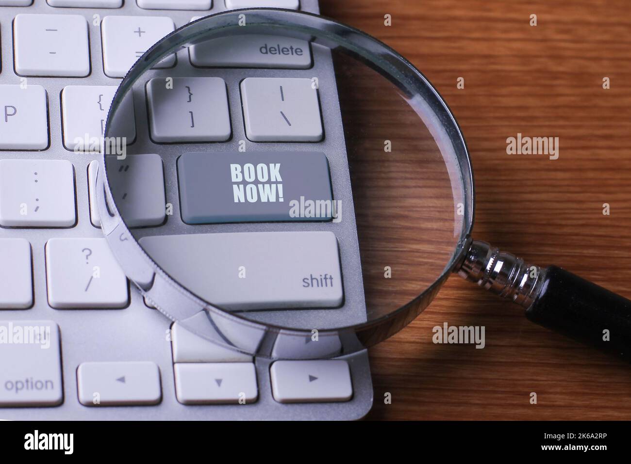BOOK NOW WORD on computer keyboard background Stock Photo
