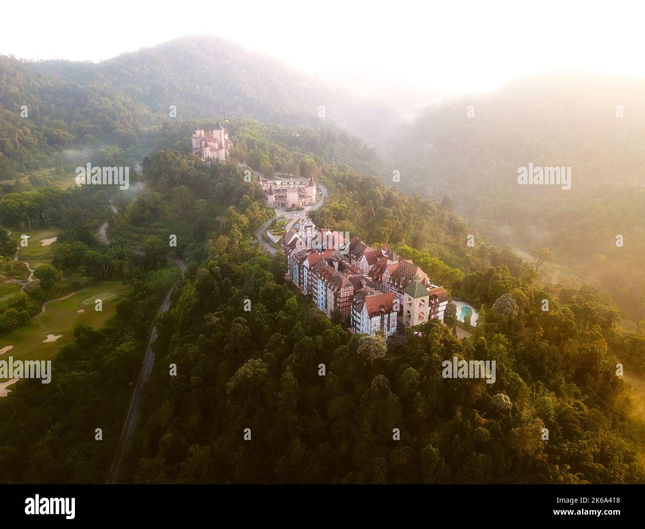 Aerial view of french style building at Bukit Tinggi with dramatic fog and sunrise Stock Photo