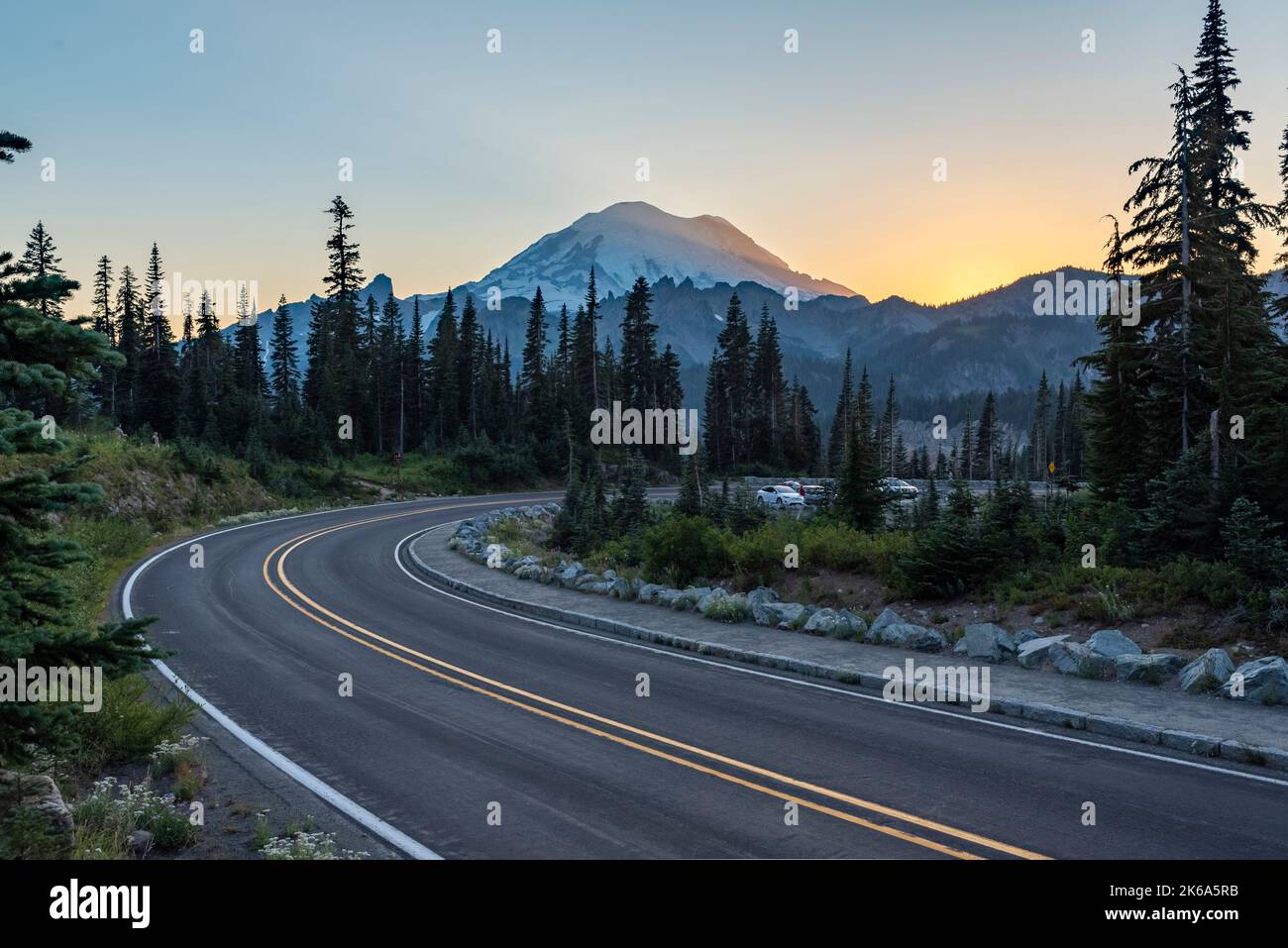 Winding Road to Mount Rainier at sunset in Mount Rainier National Park ...