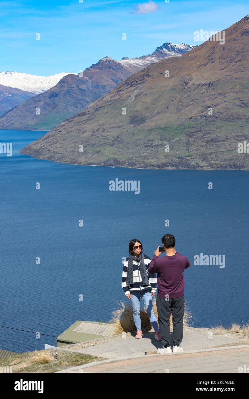 Lake Wakatipu, Queenstown , New Zealand. Tourists enjoy activities on Lake Wakatipu, Queenstown, New Zealand . Stock Photo