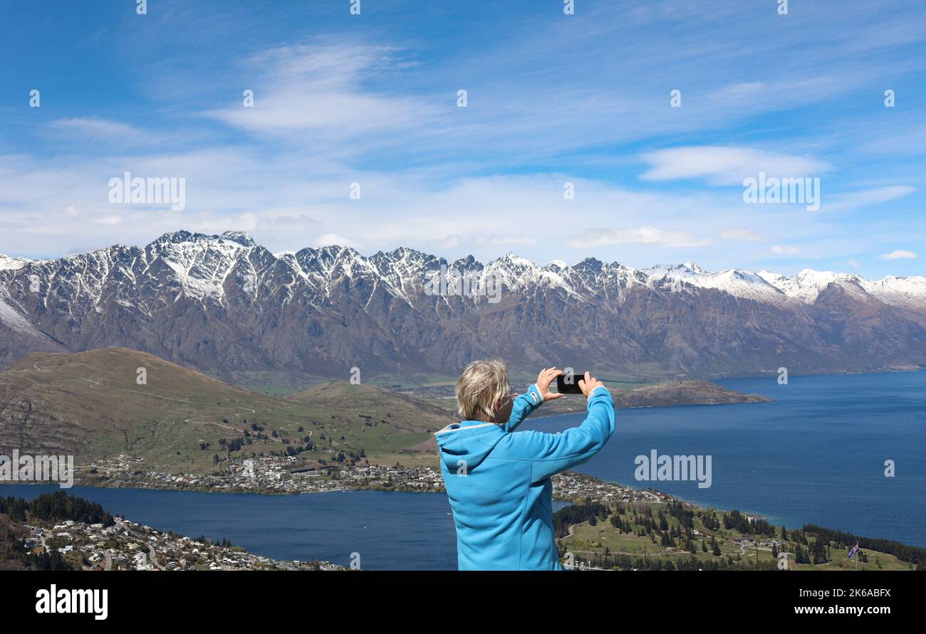 Lake Wakatipu, Queenstown , New Zealand. Tourists enjoy activities on Lake Wakatipu, Queenstown, New Zealand . Stock Photo