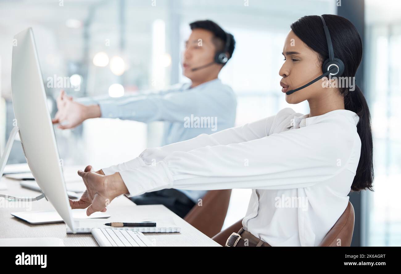 Call center, team stretching and computer office health, wellness motivation and workplace stress management. Telemarketing agent, virtual customer Stock Photo