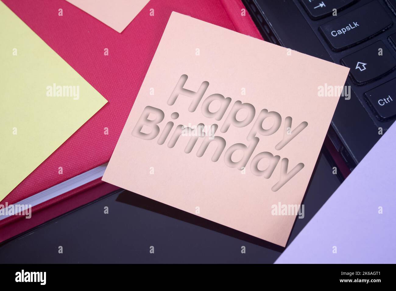 Happy Birthday. Text on adhesive note paper. Event, celebration