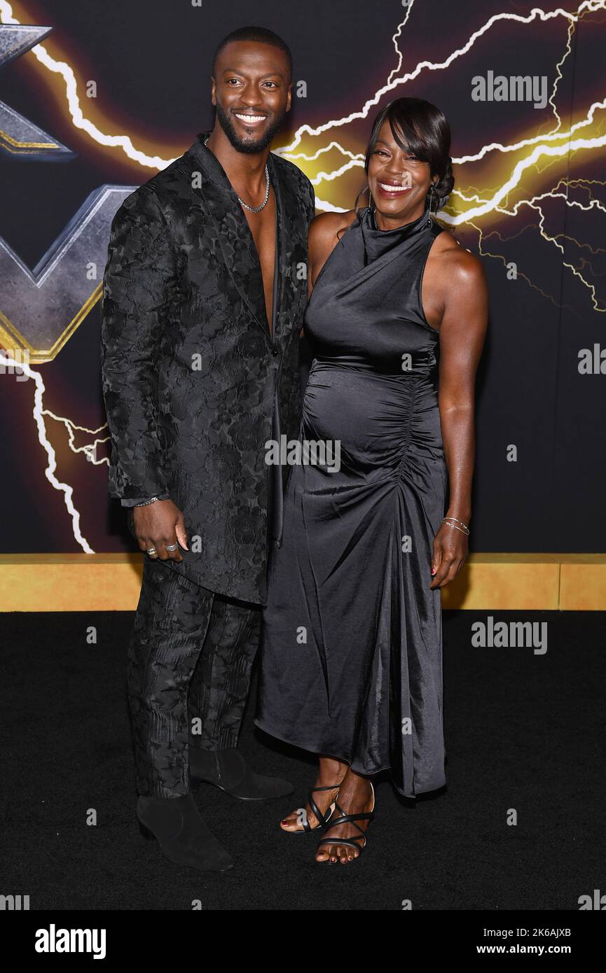 Actor Aldis Hodge and his mother attend the “Black Adam” premiere in