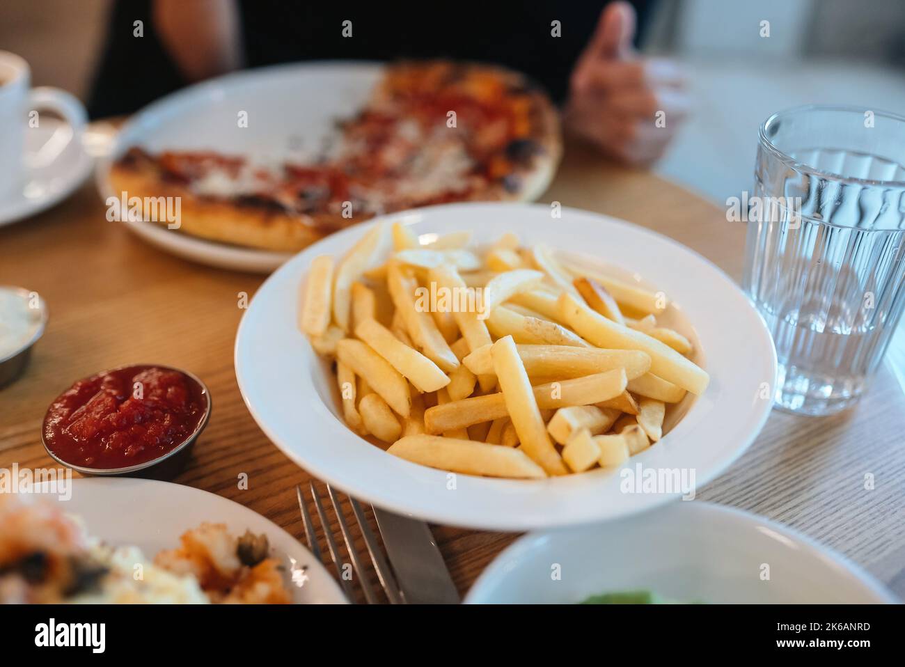 French fries or potato chips with ketchup Stock Photo Alamy