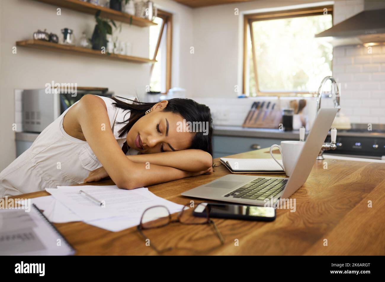 Sleeping, tired and burnout business woman feeling exhausted after overtime and dreaming while suffering from sleep apnea problem and insomnia Stock Photo