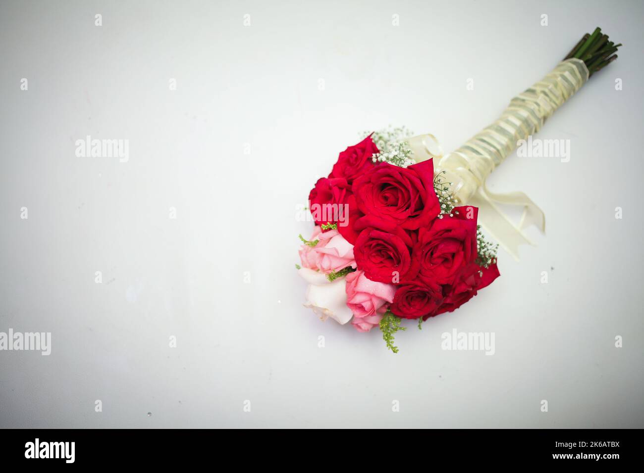 Wedding bouquet isolated on white. Fresh, lush bouquet of colorful flowers. Stock Photo
