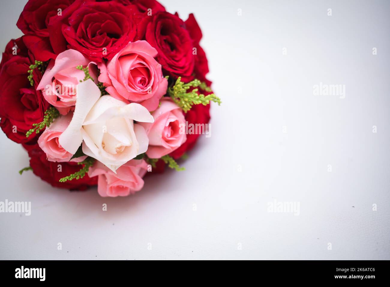 Wedding bouquet isolated on white. Fresh, lush bouquet of colorful flowers. Stock Photo