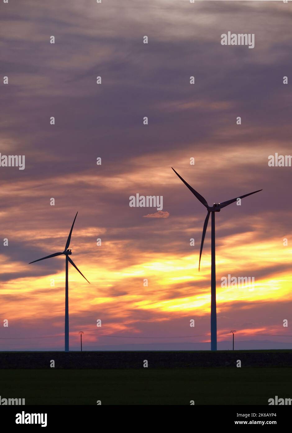 Wind turbine silhouette on beautiful sunset landscape Stock Photo - Alamy