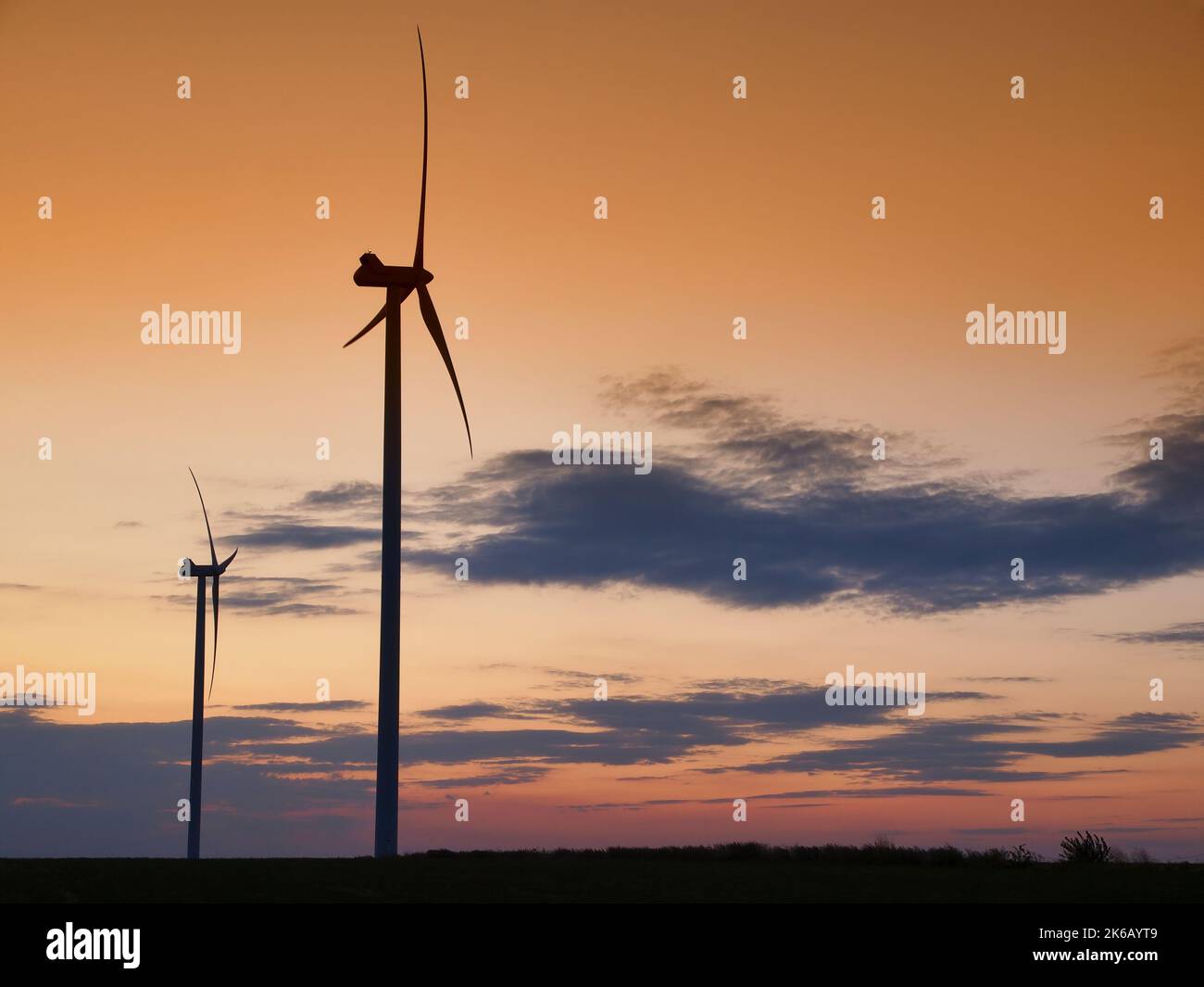 Wind turbine silhouette on beautiful sunset landscape Stock Photo - Alamy
