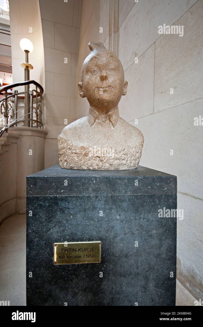 Stone bust of Tintin (character created by Hergé) by the belgian sculptor Nat Neujean in1952), Comics Art Museum, Brussels, Belgium Stock Photo
