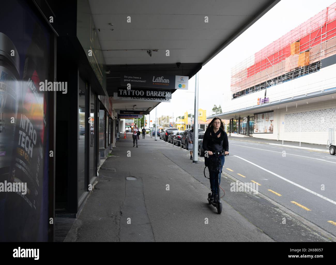 Tauranga New Zealand October 12 2022; Person on scooter commuting to