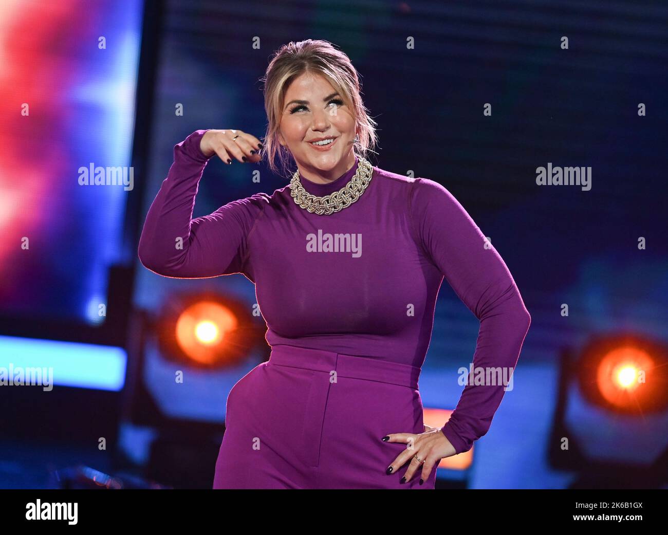 Berlin, Germany. 11th Oct, 2022. Singer and presenter Beatrice Egli is on stage during the recording of the 'Beatrice Egli Show' in Berlin-Adlershof. The show can be seen on November 26, 2022. SWR television, MDR television and Swiss television SRF are involved. Credit: Jens Kalaene/dpa/Alamy Live News Stock Photo