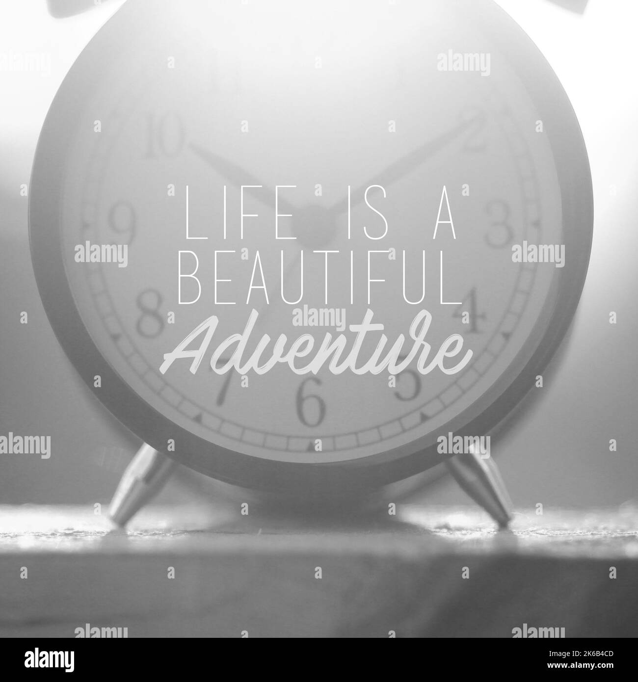 Travel inspirational quotes - Life is a beautiful adventure. Blurry retro styled background. Stock Photo