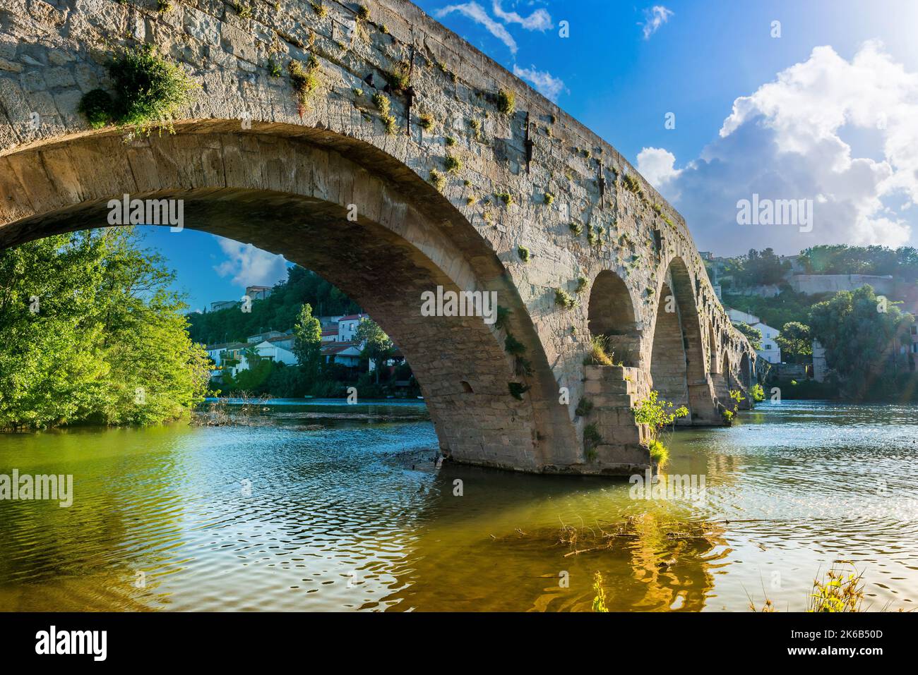 The old bridge and the river Orb, in Béziers in the Hérault in Occitanie, France. Stock Photo