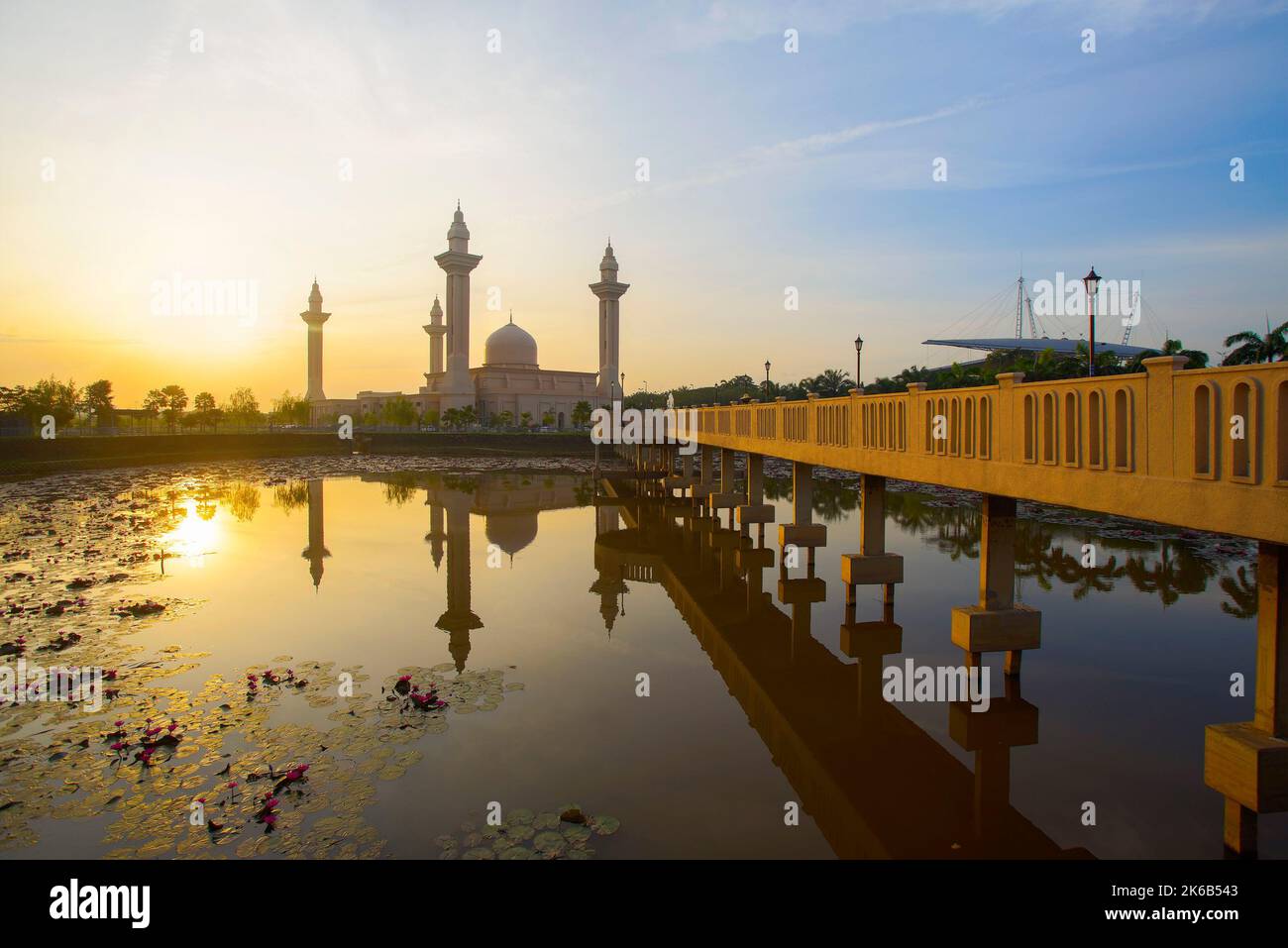 Reflection of beautiful Ampuan Jemaah mosque during sunrise Stock Photo