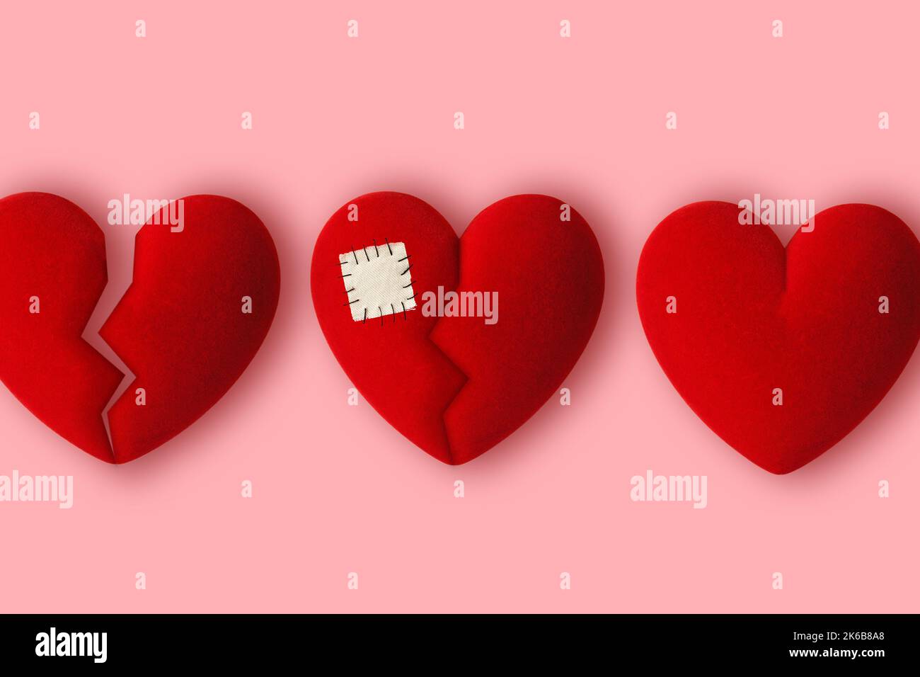 Broken heart and healed heart - Concept of love and pain Stock Photo