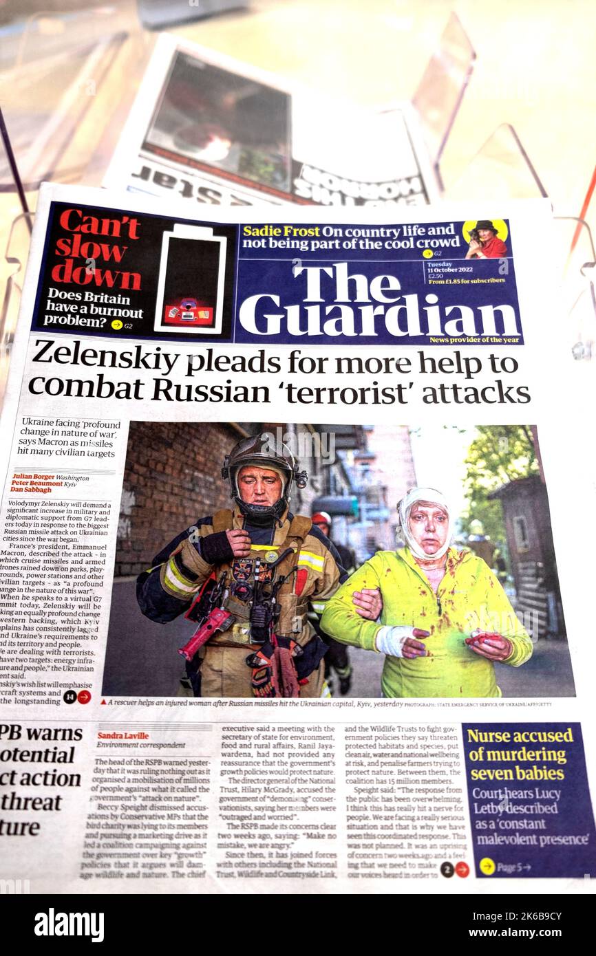 'Zelenskiy pleads for more help to combat Russian 'terrorist' attacks' Guardian newspaper headline front page Ukraine war attacks 11 October 2022 Stock Photo