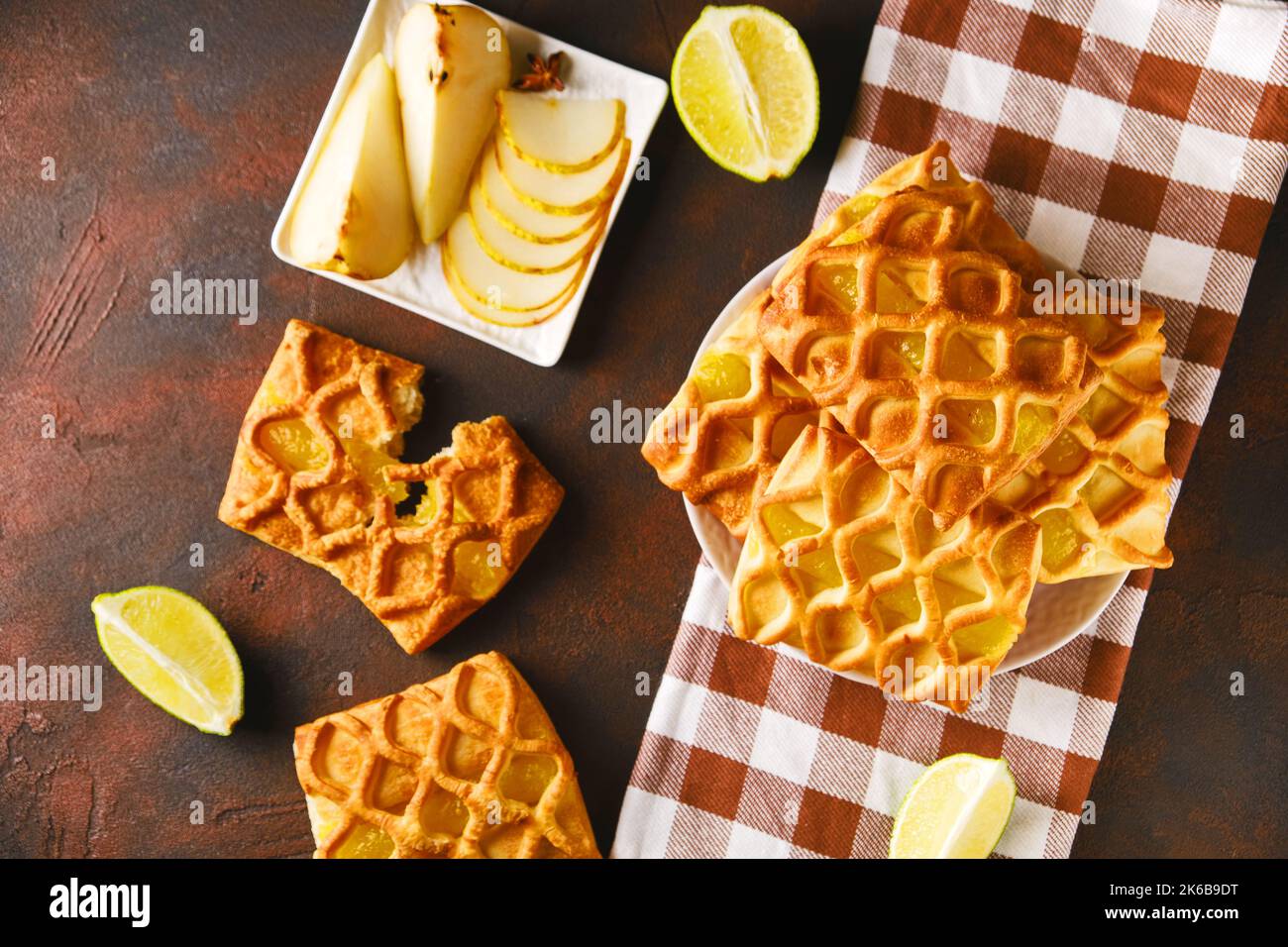 Fresh puff pastry mini pies with pear and lime jam Stock Photo - Alamy
