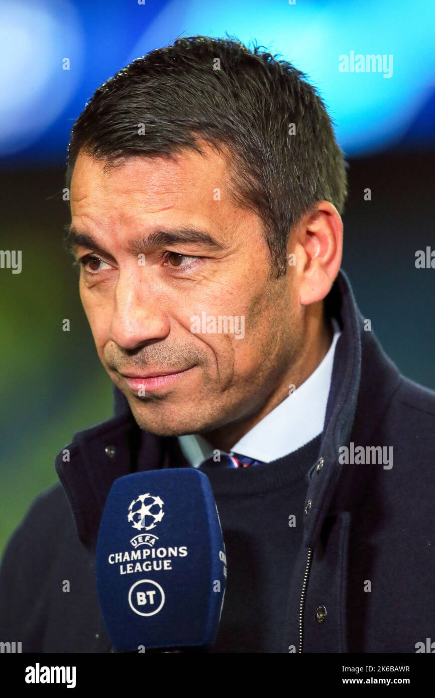 Giovanni Van Bronckhorst, coach of Rangers FC giving an interview before the Champions league match of Rangers vs Liverpool, at Ibrox, Glasgow, UK Stock Photo