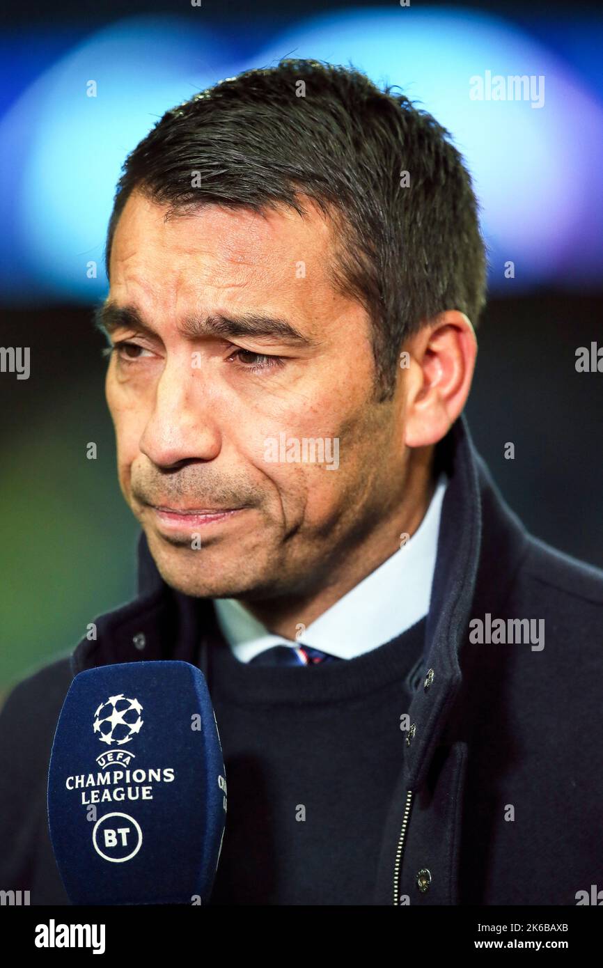 Giovanni Van Bronckhorst, coach of Rangers FC giving an interview before the Champions league match of Rangers vs Liverpool, at Ibrox, Glasgow, UK Stock Photo