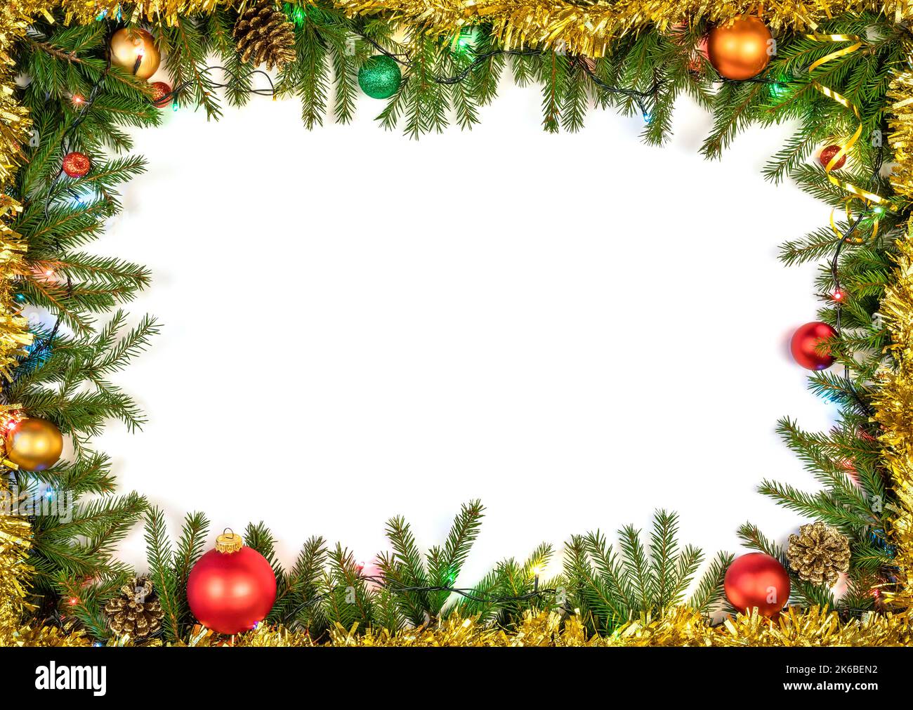 Christmas frame made of fir branches baubles cones and Christmas ...