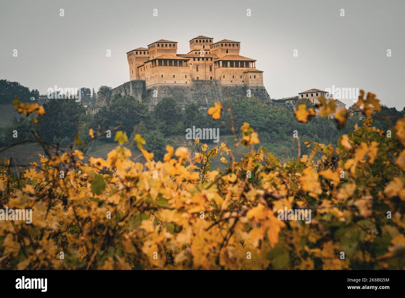 Parma, Italy,13.10.2022: famous Torrechiara Castle with vineyards in autumn colors Stock Photo
