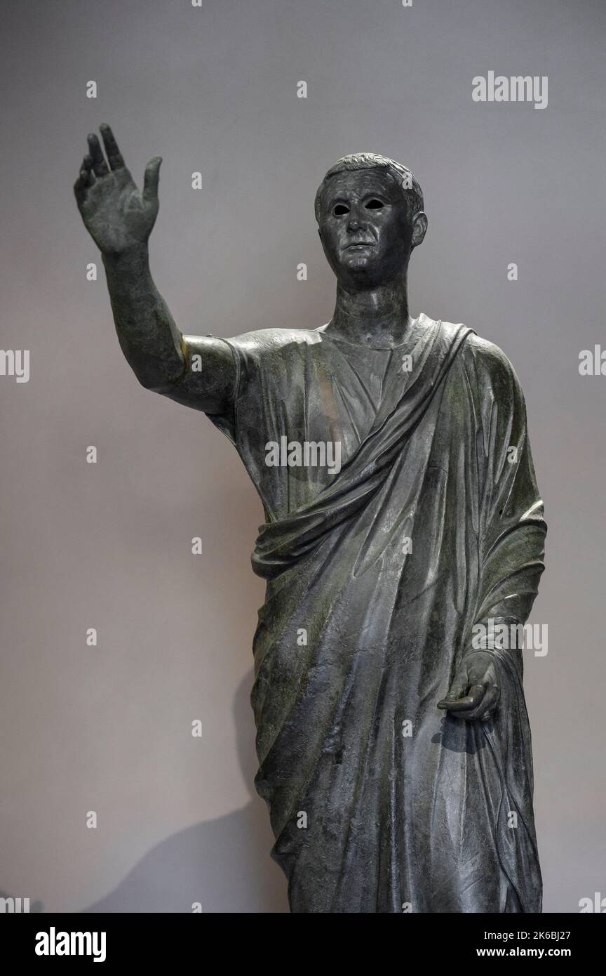 Florence. Italy. Bronze statue of the Arringatore 'The Orator', from Sanguineto (Perugia), end of 2nd - early 1st century BCE. The statue depicts the Stock Photo