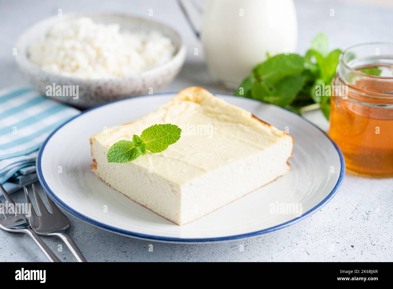 Cottage cheese, sweet ricotta casserole. Breakfast cheesecake slice Stock Photo