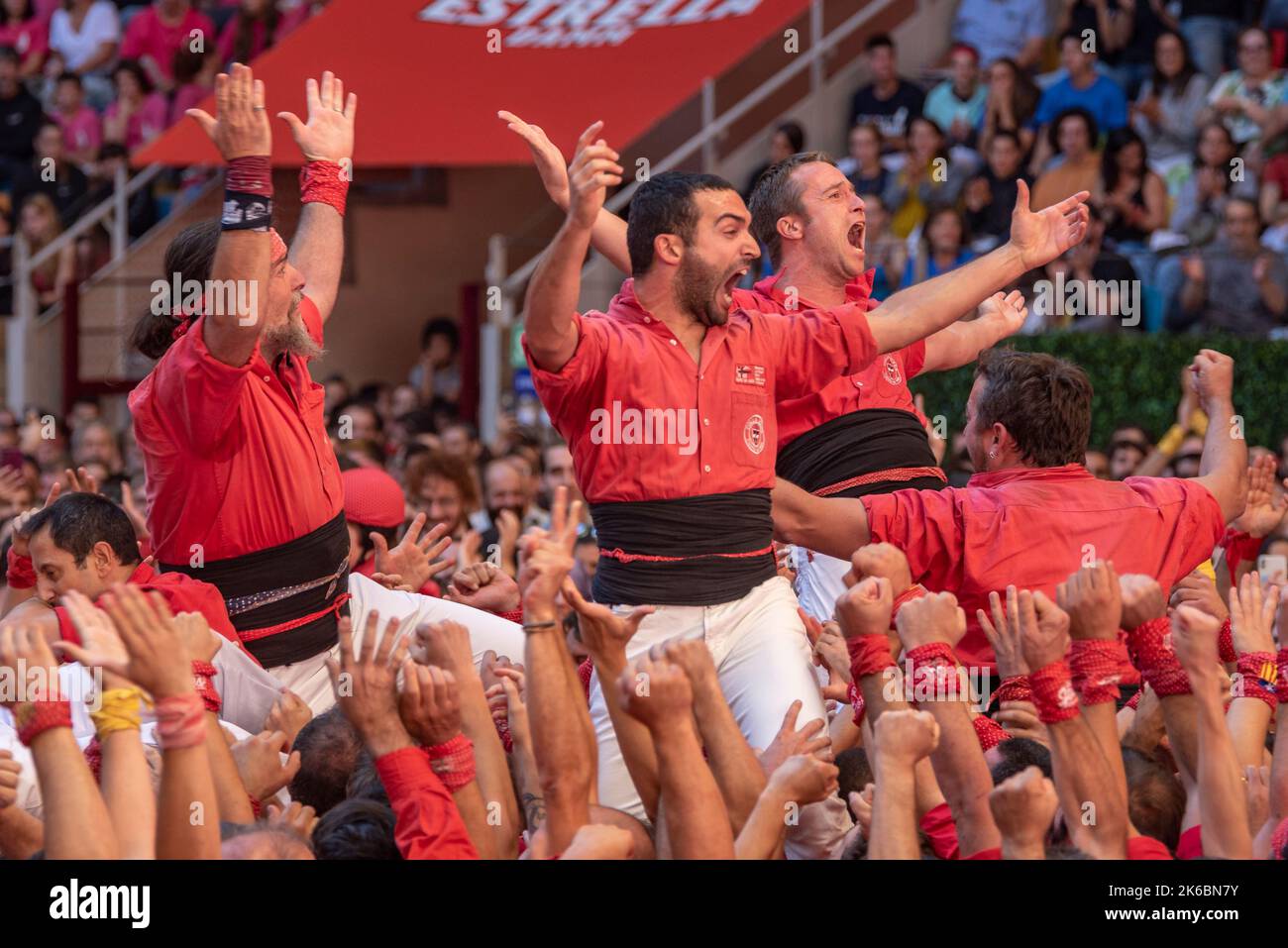 Concurs de Castells de Tarragona 2022 (Tarragona Castells contest). Sunday contest. 4 de 9 sense de la Colla Jove Xiquets de Valls (Tarragona, Spain) Stock Photo