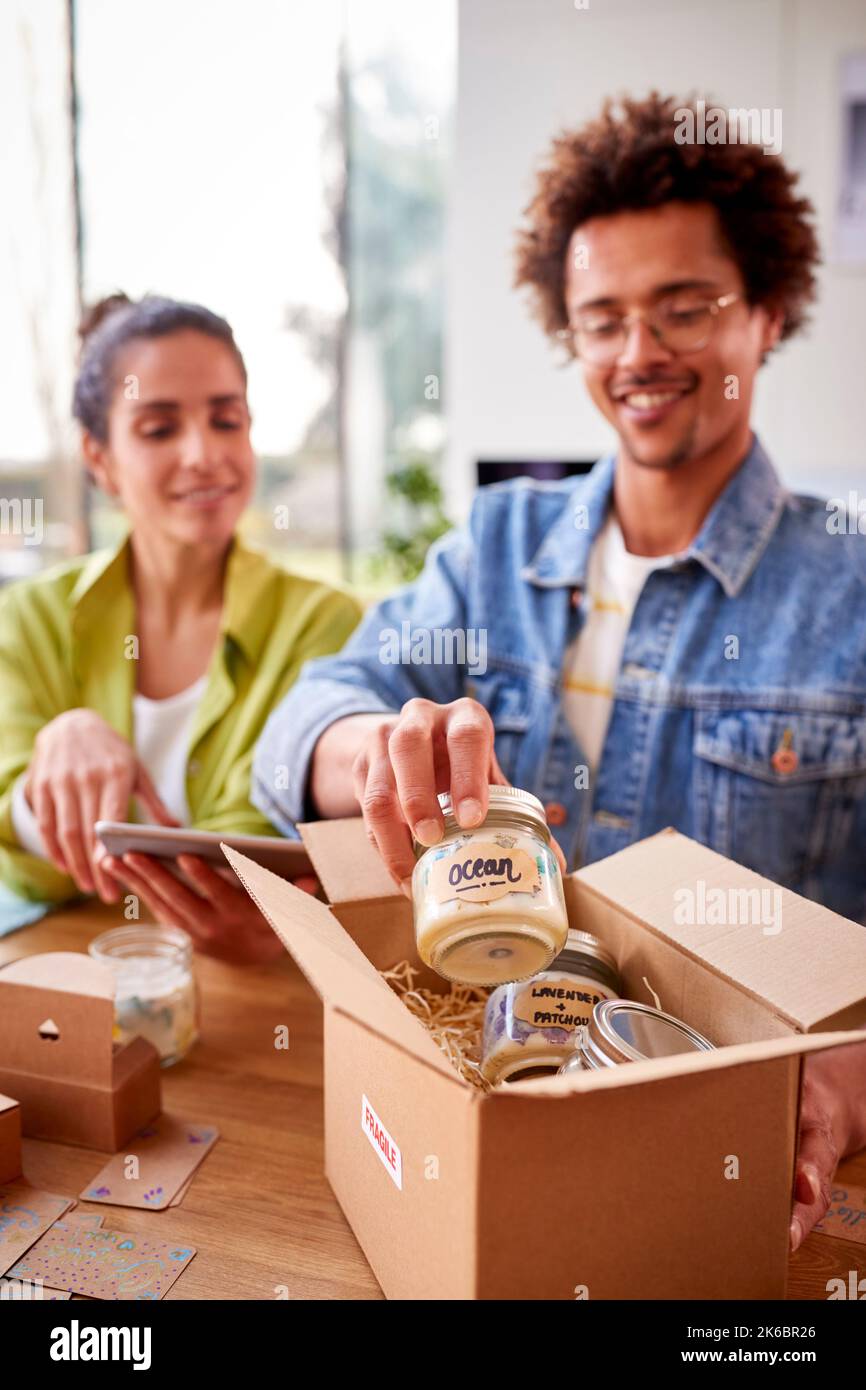 Young woman packing handmade hi-res stock photography and images - Alamy