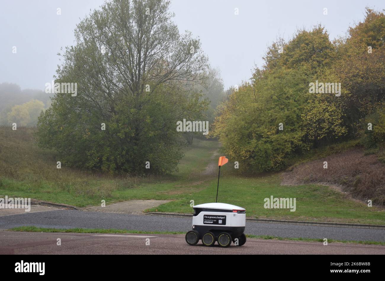 A Starship grocery delivery robot on a misty morning in Milton Keynes. Stock Photo