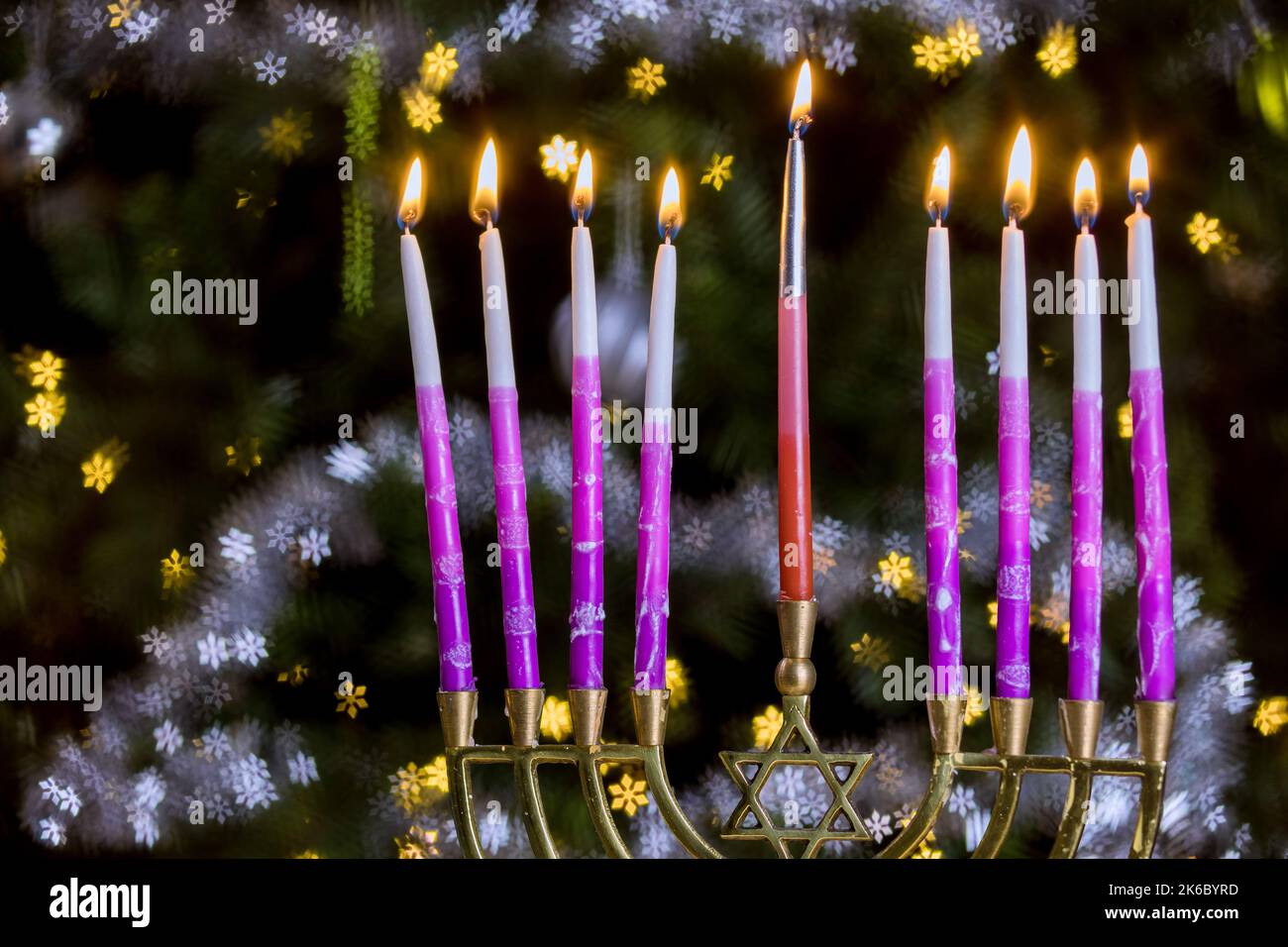 Hanukkah is Jewish holiday for There is burning candle of lit candles