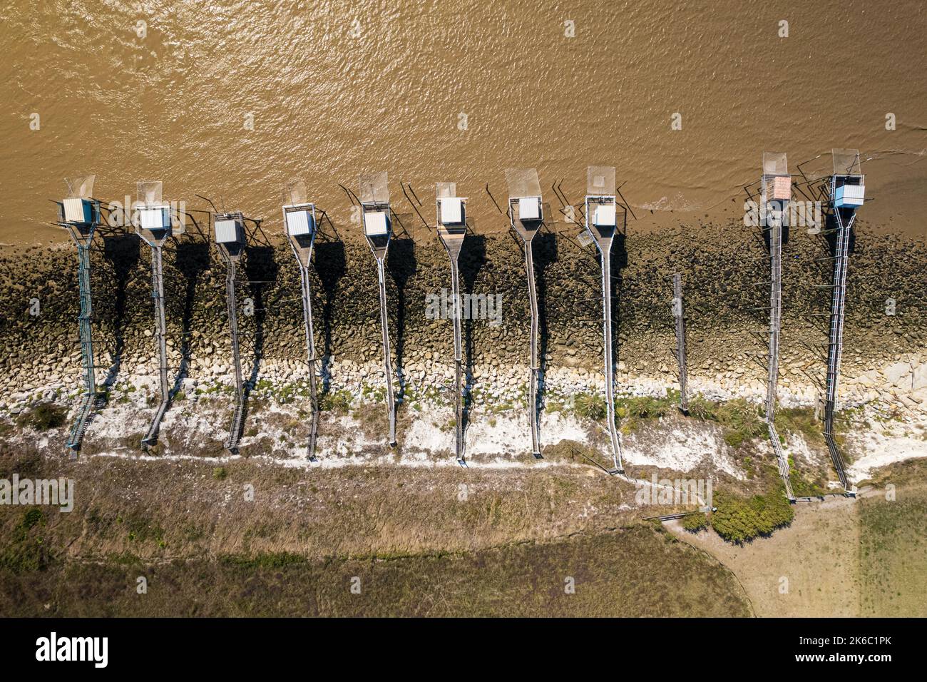 top aerial view of traditional wooden fishing huts along the Gironde estuary banks, France Stock Photo