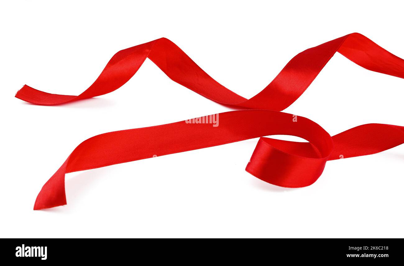 Shiny red satin ribbon isolated on white background Stock Photo - Alamy