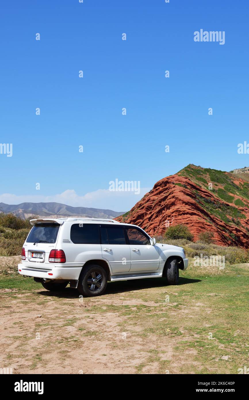 IssykKul, Kyrgyzstan Sept 19, 2022 Offroad car shown in canyon