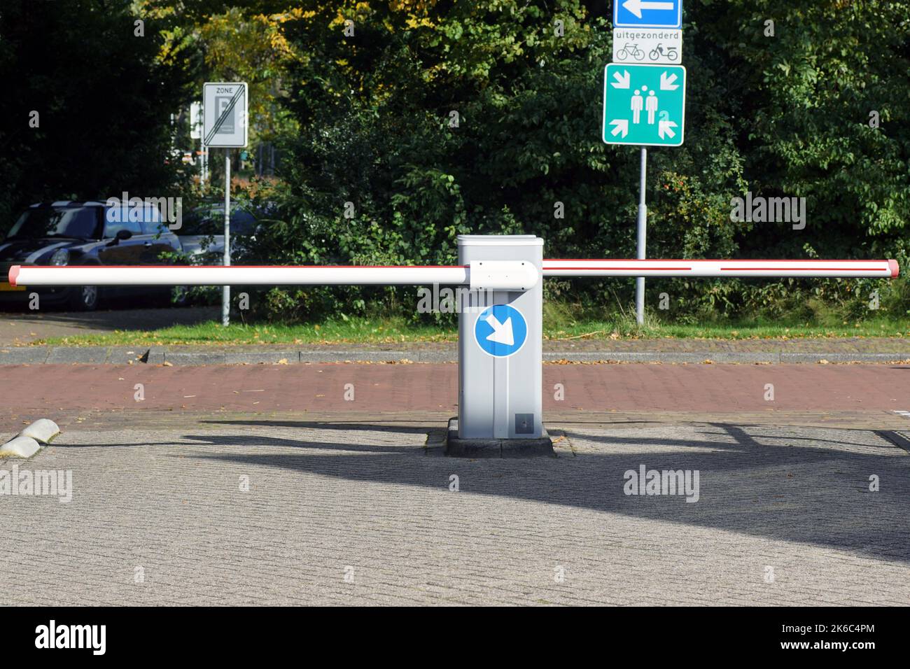 Parking barriers at the Dutch GP post with traffic signs, trees, cars ...