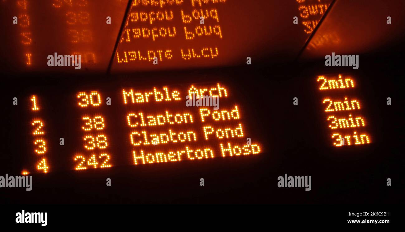 Hackney Central bus shelter, service display, early evening, London,England, UK, E8 1LL Stock Photo