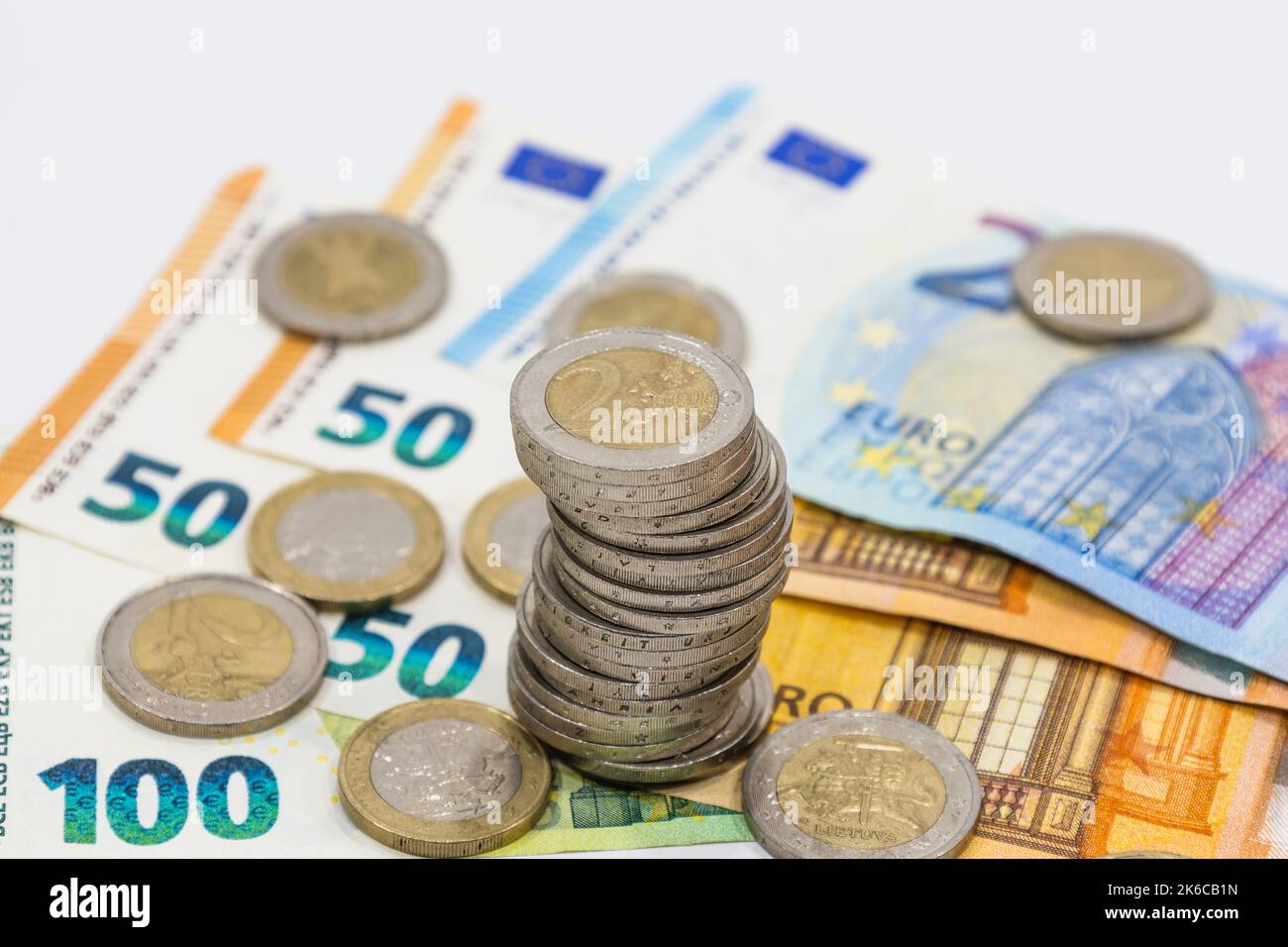 Euro notes and stacked coins. Business, success, finance, money growth, and saving money concept Stock Photo