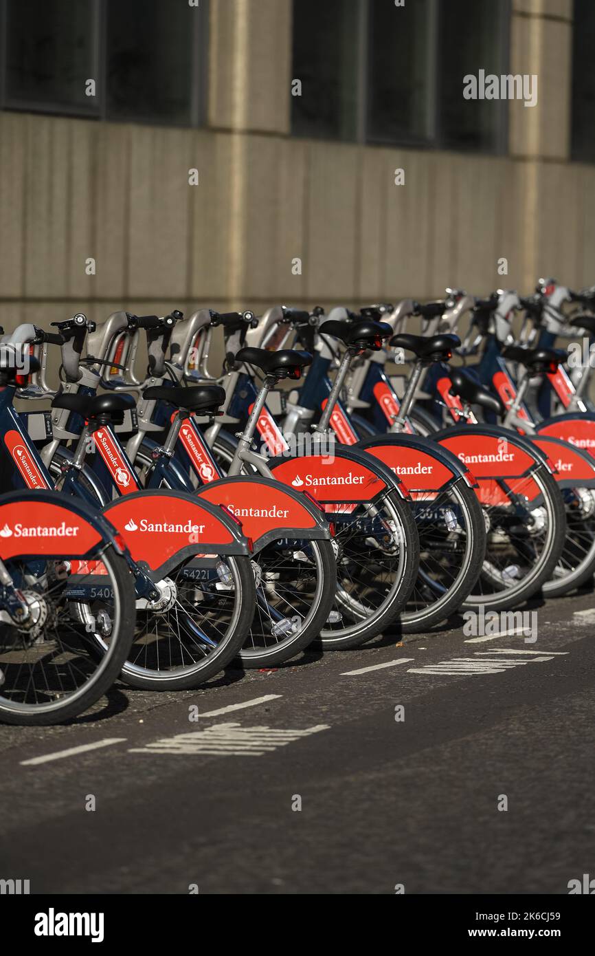 Rows of Santander sponsored rental bikes close-ups parked near the Tower of London UK. Stock Photo